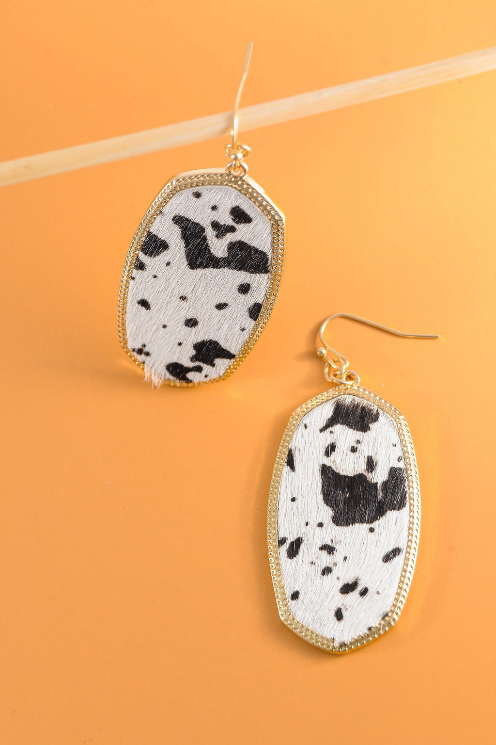 FAUX LEATHER COW PRINT GOLD DROP EARRINGS